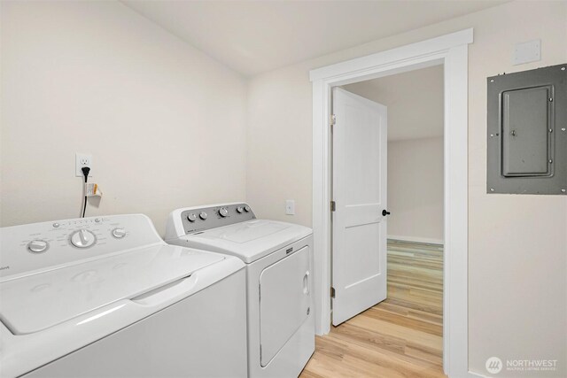 1005 Johnson St, Sumas, WA 98295 - washroom with electric panel, washer and dryer, and light wood finished floors