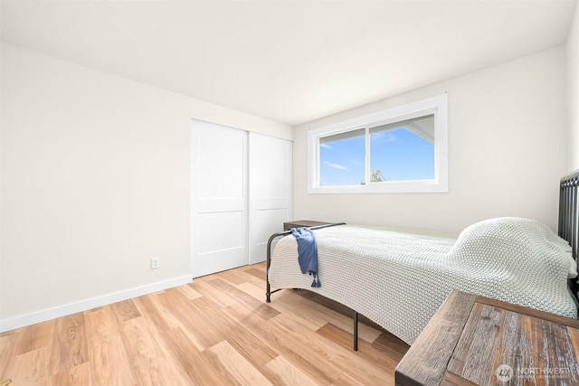 1005 Johnson St, Sumas, WA 98295 - bedroom featuring light wood-style floors, a closet, and baseboards