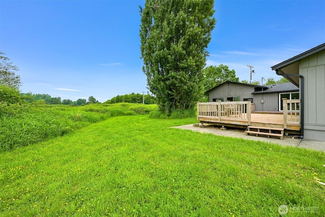 1005 Johnson St, Sumas, WA 98295 - view of grassy yard featuring a wooden deck