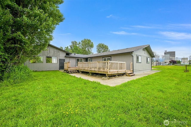 1005 Johnson St, Sumas, WA 98295 - back of house with a deck and a yard