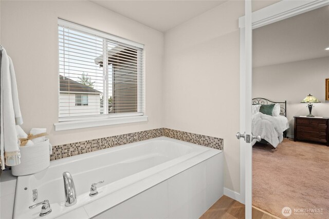1009 NE 13th St, Battle Ground, WA 98604 - bathroom featuring a bath and ensuite bathroom