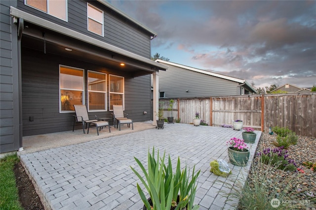 1009 NE 13th St, Battle Ground, WA 98604 - patio terrace at dusk with a patio area