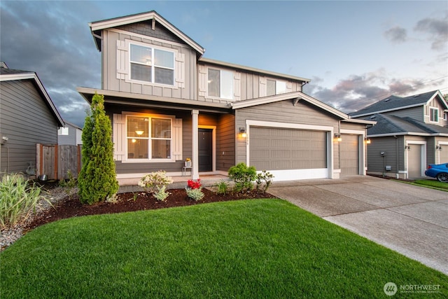 1009 NE 13th St, Battle Ground, WA 98604 - view of front of property featuring board and batten siding, a porch, an attached garage, and concrete driveway