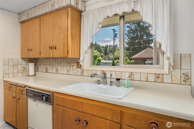 2815 NE Wyoming St, Bremerton, WA 98310 - kitchen featuring dishwasher, a sink, light countertops, and tasteful backsplash