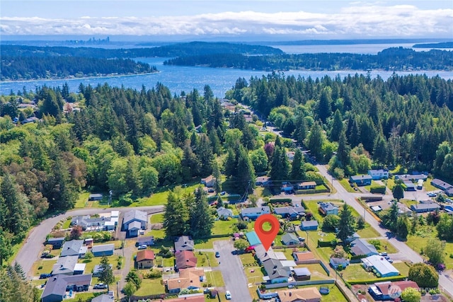 2815 NE Wyoming St, Bremerton, WA 98310 - aerial overview of property's location with a forest, a nearby body of water, and nearby suburban area