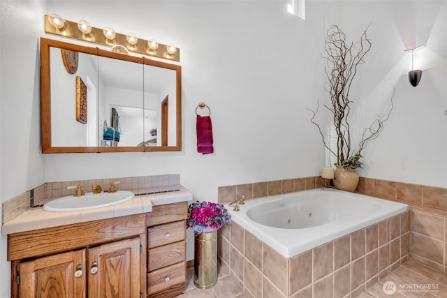 303 N B St, Roslyn, WA 98941 - bathroom with vanity, a tub with jets, and tile patterned flooring