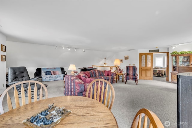 303 N B St, Roslyn, WA 98941 - carpeted dining room with rail lighting