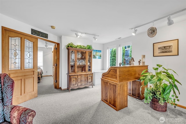 303 N B St, Roslyn, WA 98941 - office featuring track lighting, light carpet, and baseboards