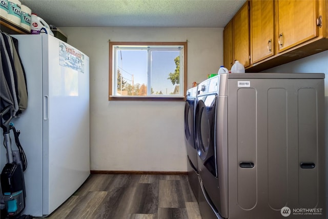 1918 E Alder St, Walla Walla, WA 99362 - laundry area with cabinet space, dark wood-style floors, separate washer and dryer, and a textured ceiling