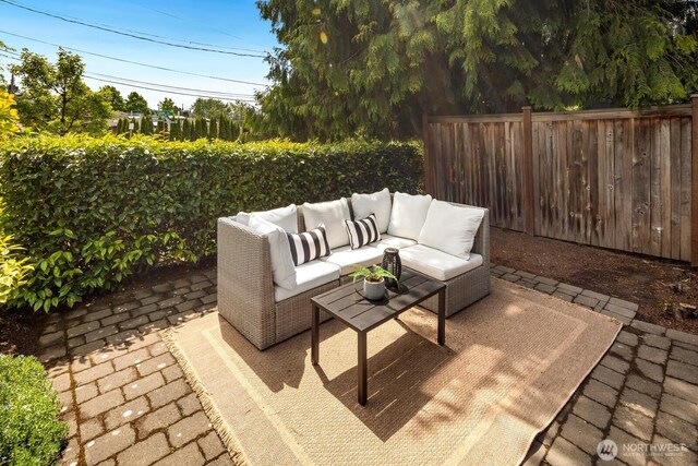 116 E Edgar St, Seattle, WA 98102 - fenced backyard featuring a patio area and an outdoor living space