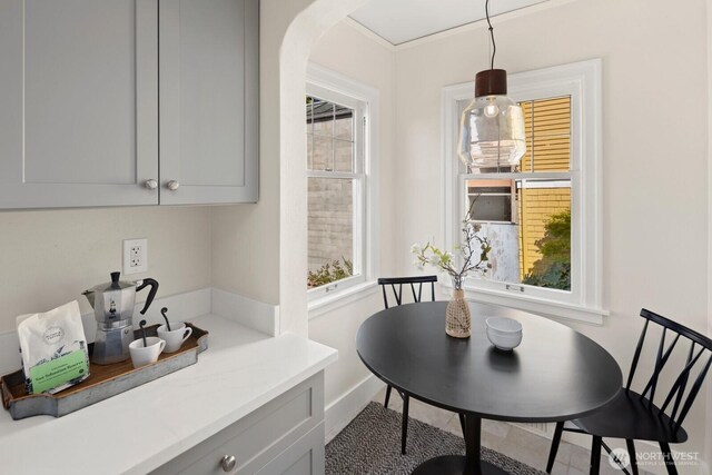 116 E Edgar St, Seattle, WA 98102 - dining room with arched walkways and baseboards
