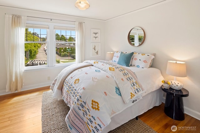 116 E Edgar St, Seattle, WA 98102 - bedroom featuring wood finished floors and baseboards