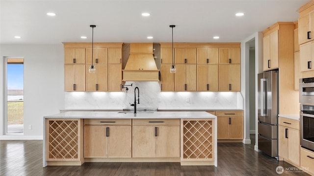 6988 Stonecrest Rd NE, Moses Lake, WA 98837 - kitchen with high end fridge, light brown cabinets, custom range hood, backsplash, and a sink