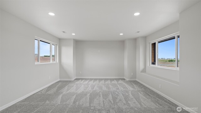 6988 Stonecrest Rd NE, Moses Lake, WA 98837 - spare room featuring recessed lighting, carpet, and baseboards