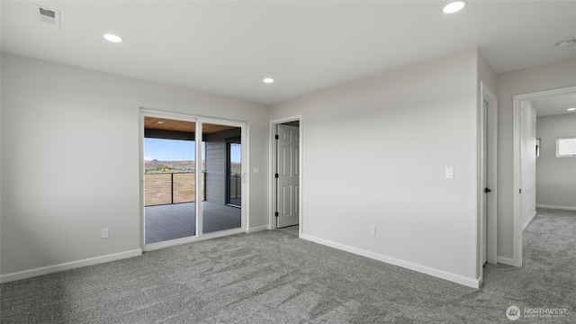 6988 Stonecrest Rd NE, Moses Lake, WA 98837 - carpeted spare room featuring recessed lighting, baseboards, and a smoke detector