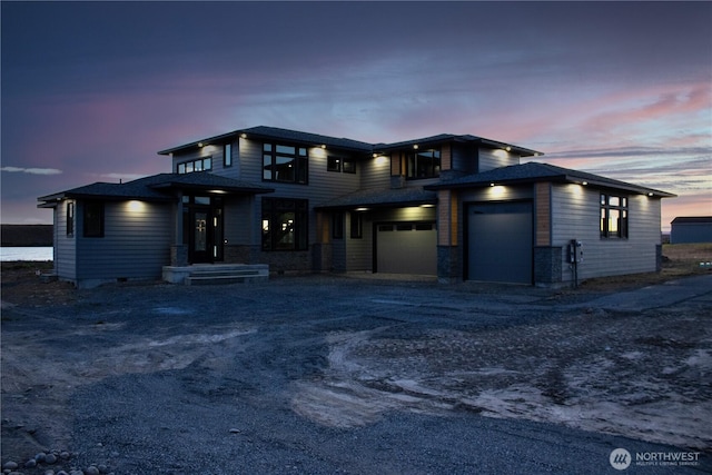 6988 Stonecrest Rd NE, Moses Lake, WA 98837 - prairie-style home featuring a garage and dirt driveway