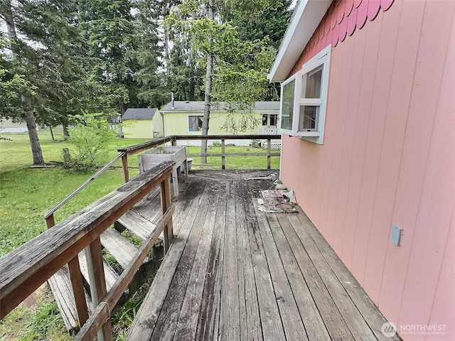 8304 192nd Street Ct E Unit 24, Spanaway, WA 98387 - deck with a yard and view of scattered trees