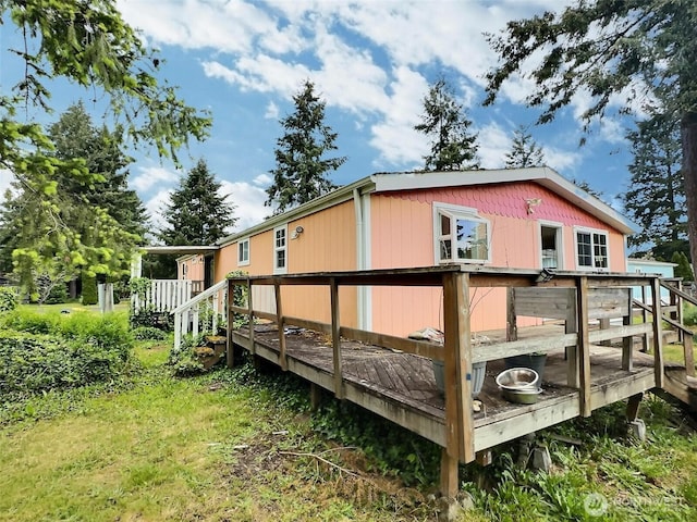 8304 192nd Street Ct E Unit 24, Spanaway, WA 98387 - back of property featuring a deck