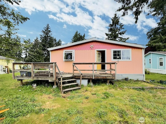 8304 192nd Street Ct E Unit 24, Spanaway, WA 98387 - back of property with a wooden deck