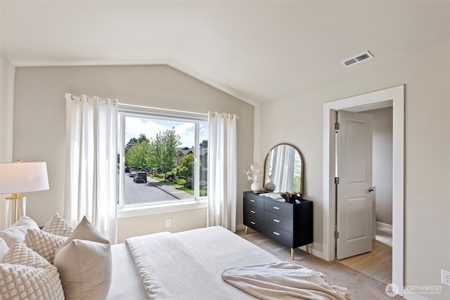 938 SW 97th St, Seattle, WA 98106 - bedroom with lofted ceiling, light wood-type flooring, and baseboards