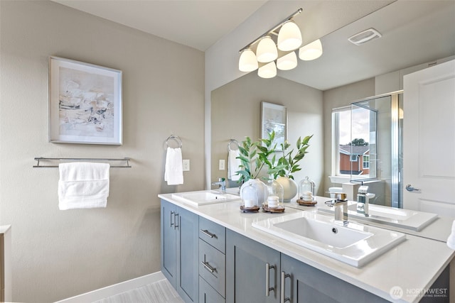 938 SW 97th St, Seattle, WA 98106 - full bathroom with a stall shower, double vanity, and baseboards