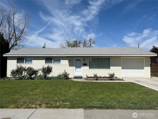 822 S Evergreen Dr, Moses Lake, WA 98837 - ranch-style house with an attached garage, a front lawn, concrete driveway, and a shingled roof