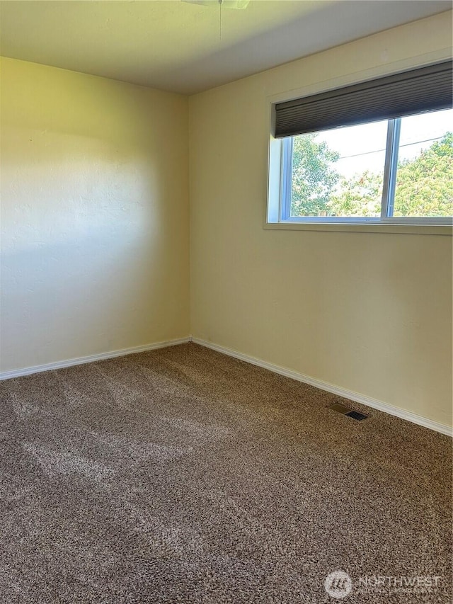 822 S Evergreen Dr, Moses Lake, WA 98837 - carpeted spare room featuring baseboards