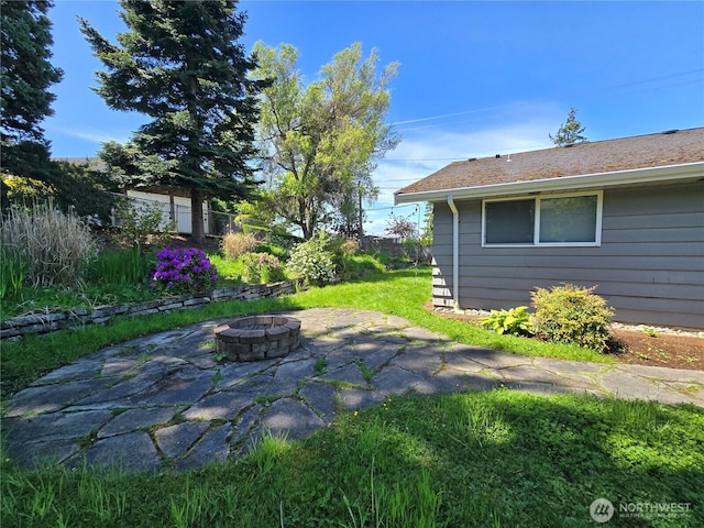1012 9th Ave N, Edmonds, WA 98020 - view of yard featuring an outdoor fire pit and a patio
