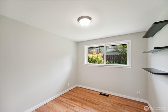 1012 9th Ave N, Edmonds, WA 98020 - spare room with baseboards and light wood-style floors
