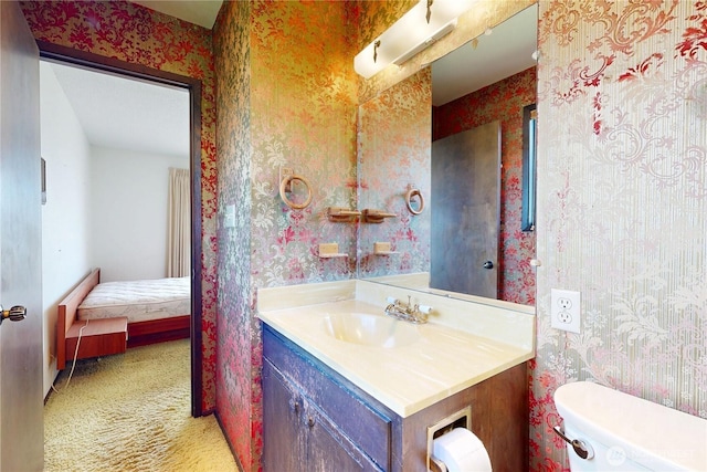 1220 Valley Vista Ave, Walla Walla, WA 99362 - bathroom with wallpapered walls, vanity, toilet, and connected bathroom