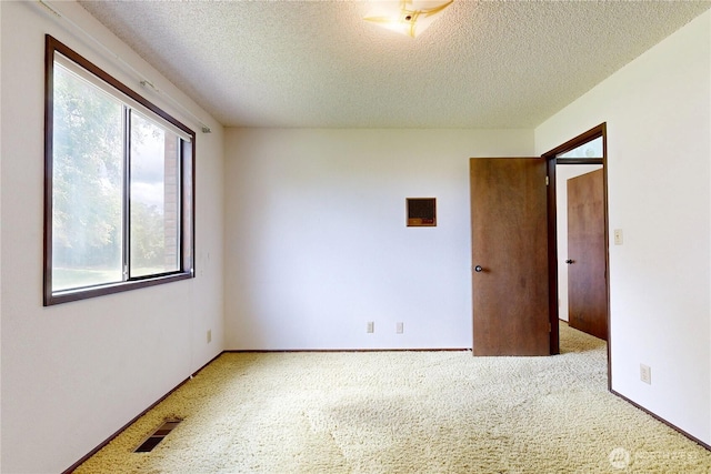 1220 Valley Vista Ave, Walla Walla, WA 99362 - carpeted empty room with a textured ceiling