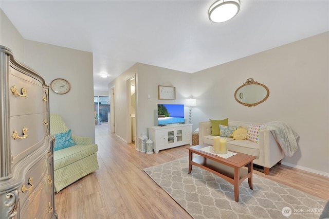 20620 76th Ave W Unit A, Edmonds, WA 98026 - living area featuring light wood-type flooring and baseboards