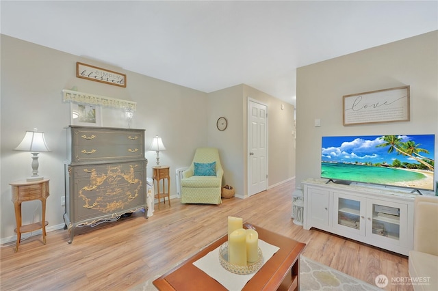 20620 76th Ave W Unit A, Edmonds, WA 98026 - living room featuring wood finished floors and baseboards