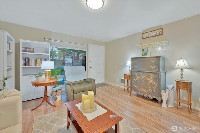 20620 76th Ave W Unit A, Edmonds, WA 98026 - living area featuring wood finished floors and baseboards