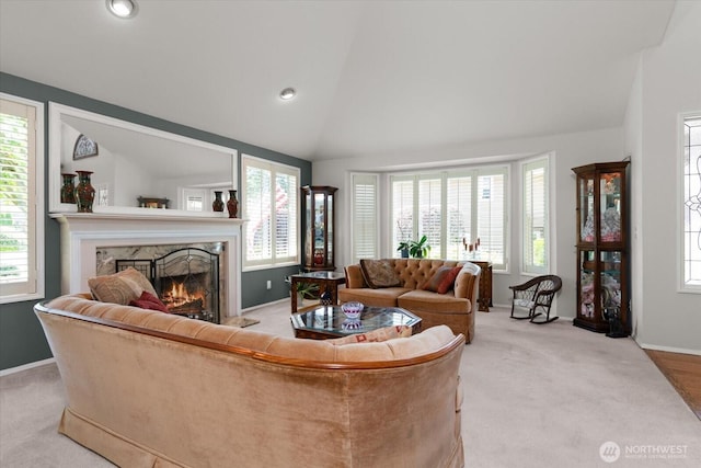 16605 71st Pl W, Lynnwood, WA 98037 - living room featuring vaulted ceiling, a premium fireplace, light carpet, baseboards, and recessed lighting
