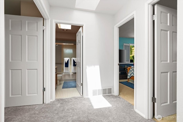 16605 71st Pl W, Lynnwood, WA 98037 - hallway featuring carpet floors and a skylight