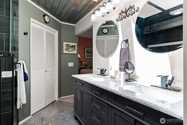 16605 71st Pl W, Lynnwood, WA 98037 - bathroom featuring double vanity, a closet, wood ceiling, and ensuite bathroom