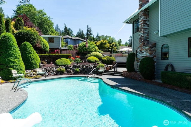 16605 71st Pl W, Lynnwood, WA 98037 - outdoor pool featuring a fenced backyard and a patio