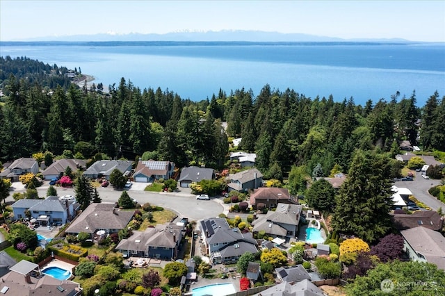 16605 71st Pl W, Lynnwood, WA 98037 - aerial perspective of suburban area featuring a pool and a nearby body of water