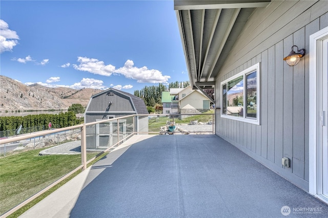 421 Lakeview Dr, Orondo, WA 98843 - view of patio / terrace featuring a mountain view and an outdoor structure