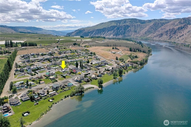 421 Lakeview Dr, Orondo, WA 98843 - aerial perspective of suburban area with a water and mountain view