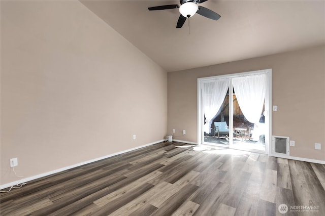 15127 148th Avenue Ct E, Orting, WA 98360 - empty room with a ceiling fan, wood finished floors, baseboards, lofted ceiling, and heating unit