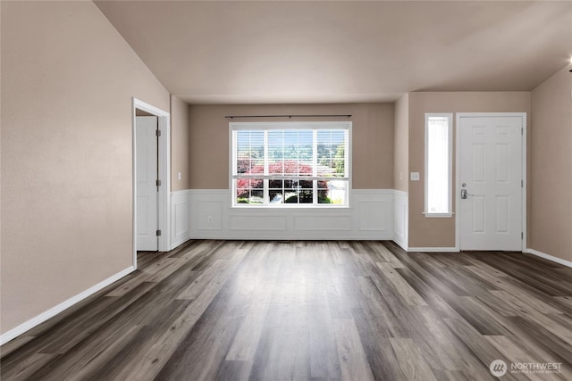 15127 148th Avenue Ct E, Orting, WA 98360 - foyer entrance with dark wood-type flooring and wainscoting