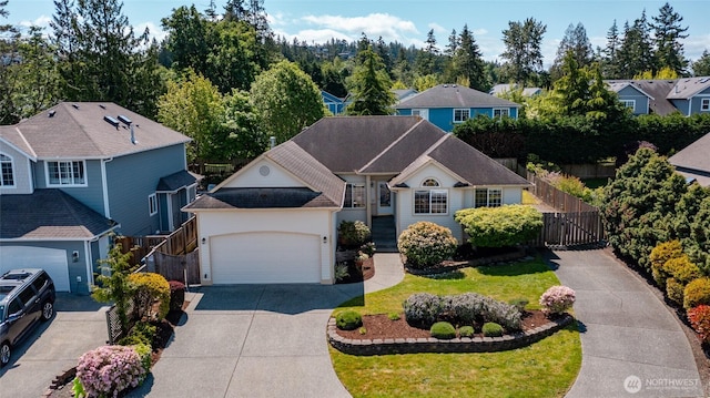 3901 Sterling Pl, Anacortes, WA 98221 - view of front facade featuring driveway, a gate, a garage, and a residential view