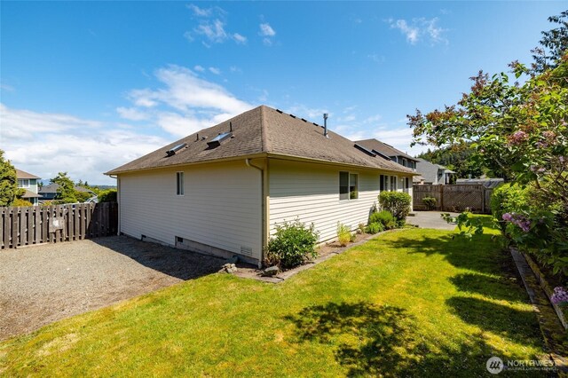 3901 Sterling Pl, Anacortes, WA 98221 - view of side of property featuring a patio and a shingled roof