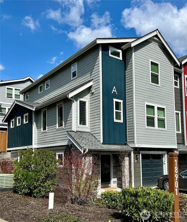 18901 12th Pl W Unit A1, Lynnwood, WA 98036 - view of property with board and batten siding