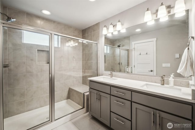 18901 12th Pl W Unit A1, Lynnwood, WA 98036 - full bathroom with double vanity, a shower stall, tile patterned flooring, and recessed lighting