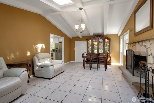 2419 SW 316th St, Federal Way, WA 98023 - living area featuring a chandelier, light tile patterned floors, a fireplace, and baseboards