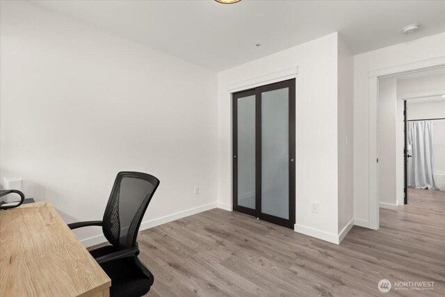 12125 E Woodland Ave, Puyallup, WA 98373 - office with wood finished floors and baseboards