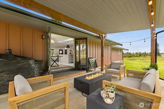 12125 E Woodland Ave, Puyallup, WA 98373 - view of patio / terrace featuring an outdoor living space with a fire pit